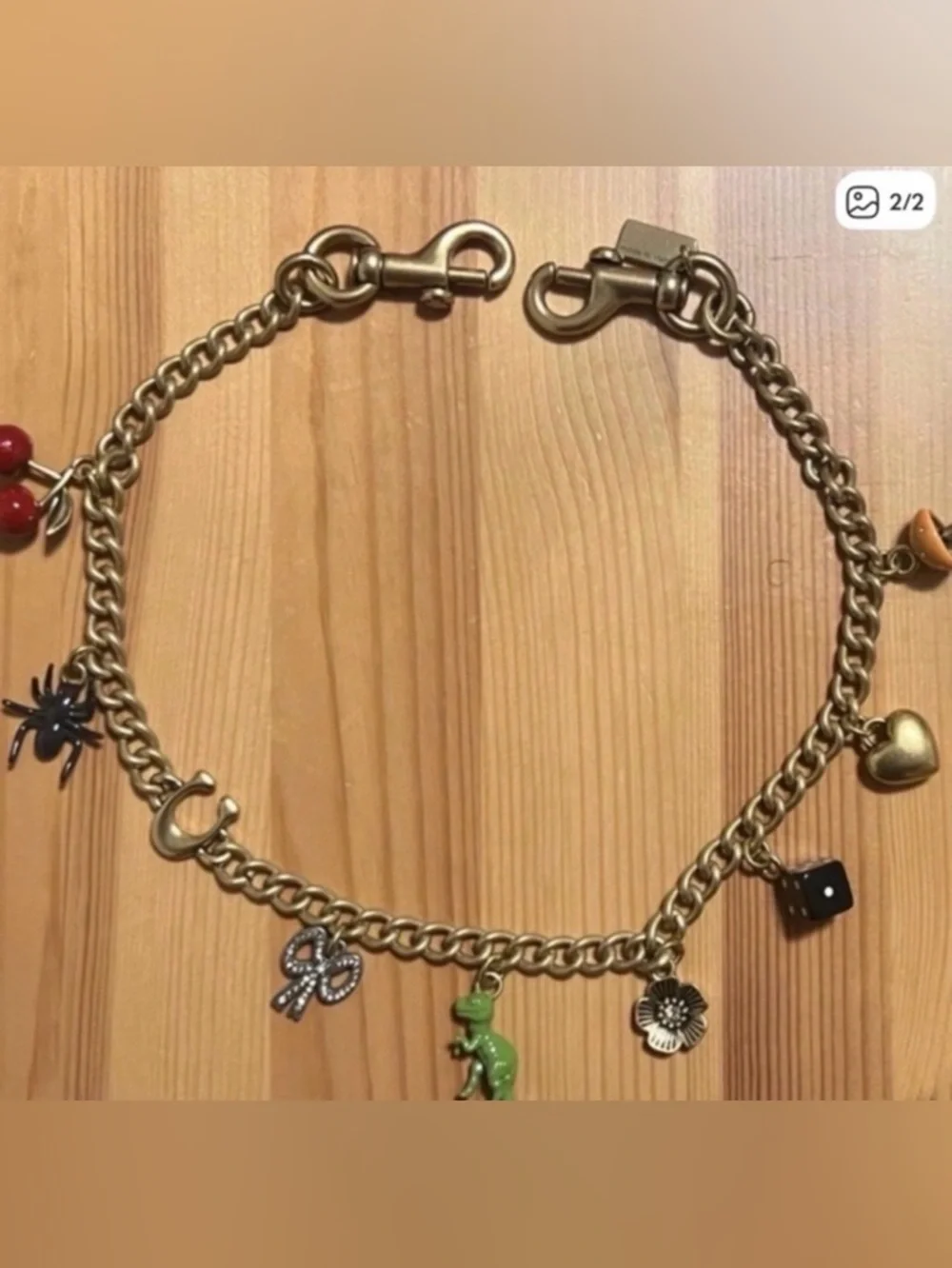 Coach Gold-Tone Chain Charm Strap with Multicolor Dangling Charms - Picture 2 of 2